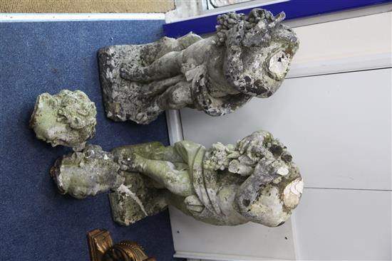 A set of eight reconstituted stone figures of putti holding vines, floral swags and other foliate motifs, H. 2ft 4in.